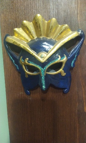 Maschera blu e oro con copricapo a ventaglio